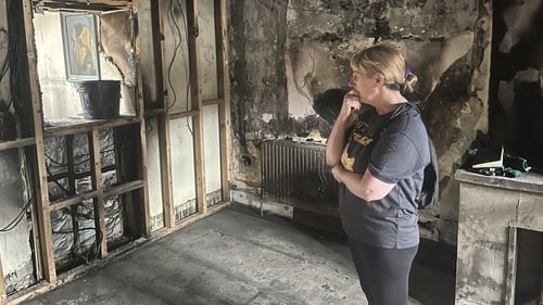 Breda Curran surveys the damage to her home in Ballyfermot, Dublin