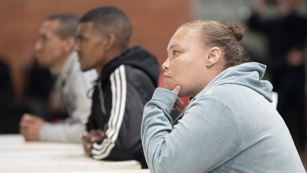 Racquel 'Kelly' Smith listens to proceedings in court where she and her co-accused were sentenced to life
