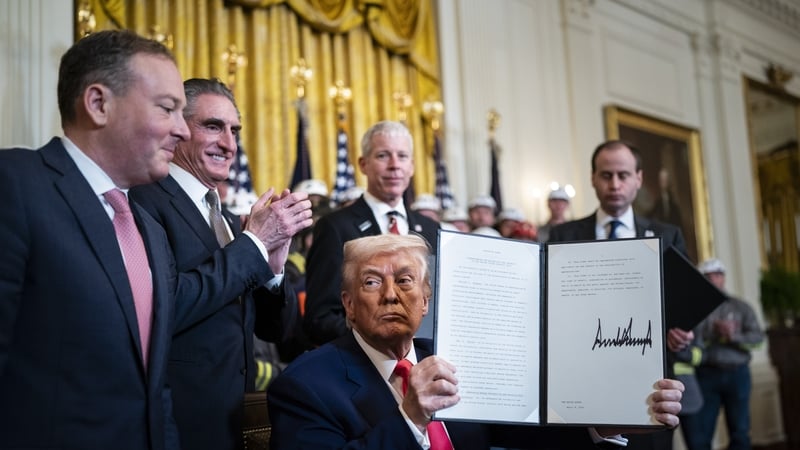 President Donald Trump signs executive orders about coal production during a "Unleashing American Energy Executive Order Signing Event"