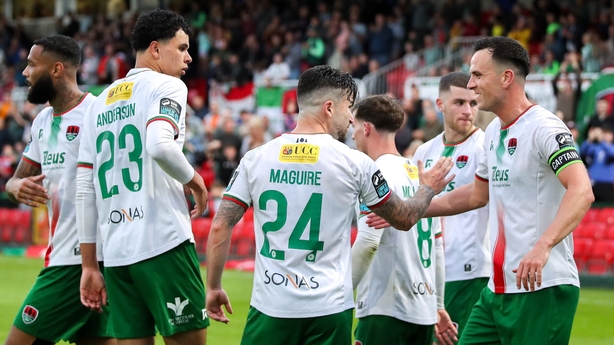 Seani Maguire is congratulated by Cork City team-mates after his goal against Shelbourne