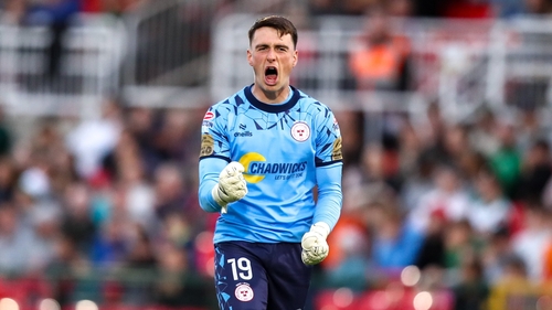 Shelbourne goalkeeper Lorcan Healy celebrates Ali Coote's goal against Cork City