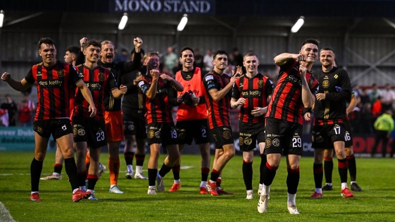 Bohemians players celebrate victory over Derry City at the full-time whistle