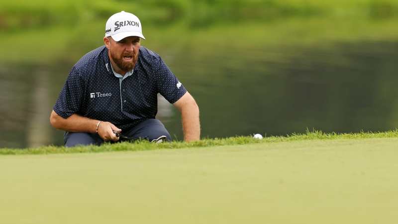 Shane Lowry lines up a putt on the 14th green during his second round at Muirfield Village Golf Club