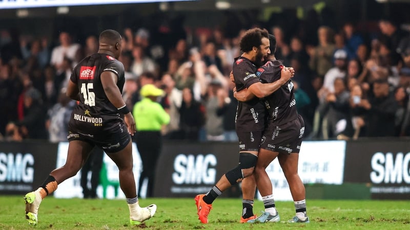 Jaden Hendrikse celebrates with Bradley Davids after the winning Sharks kick
