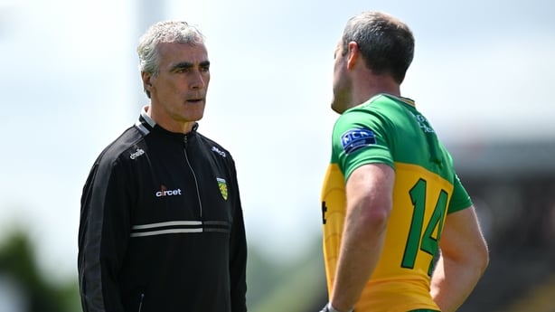 Donegal manager Jim McGuinness, left, and Michael Murphy