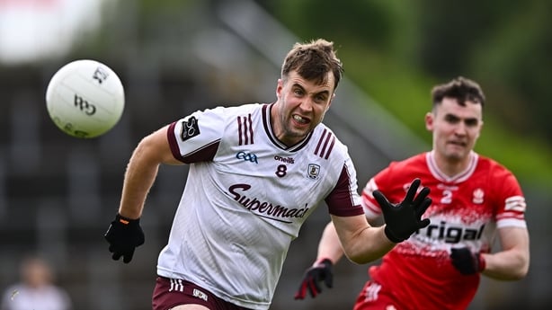 Paul Conroy of Galway in action against Diarmuid Baker of Derry during the GAA Football All-Ireland Senior Championship Round 2 match between Derry and Galway at Celtic Park in Derry. 