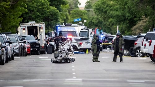Bomb squads set up a staging area following the incident which the FBI is investigating as an act of terror