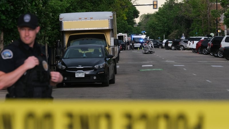 A bomb disposal robot, or Explosive Ordnance Disposal robot, sits on Pearl Street on the site of the attack