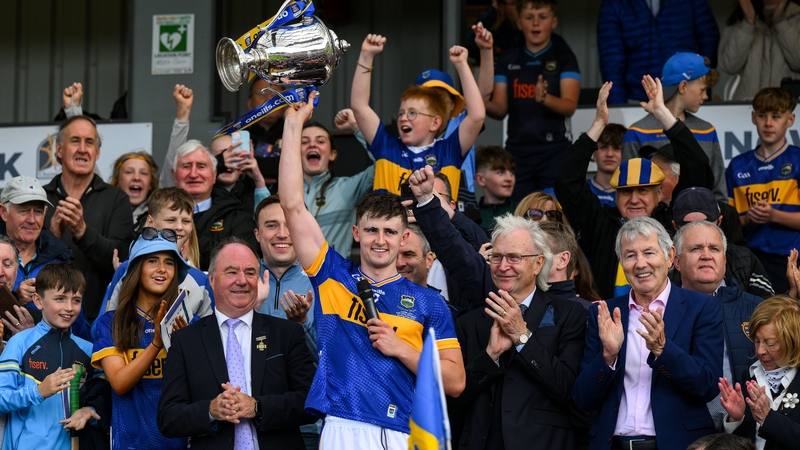 Tipperary U-20 Sam O'Farrell lifts the James Nowlan Cup