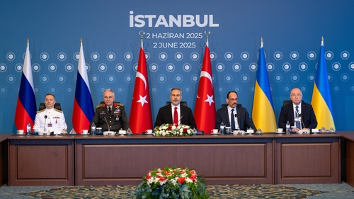 Turkish Foreign Minister Hakan Fidan, centre, chairing the Turkiye-Russia-Ukraine Trilateral Meeting in Istanbul today