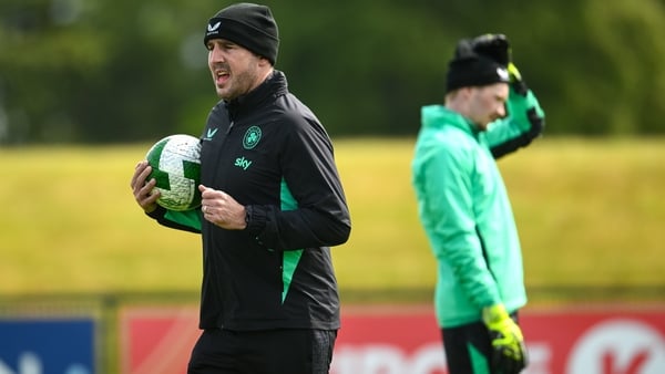 3 June 2025; Assistant head coach John O'Shea, right, and goalkeeper Caoimhin Kelleher during a Republic of Ireland training session at the FAI National Training Centre in Abbotstown, Dublin. Photo by Ramsey Cardy/Sportsfile