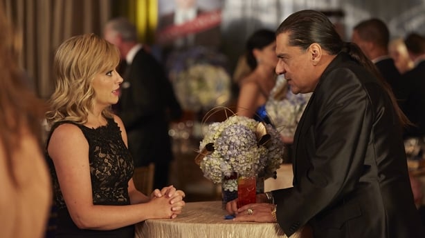  Amy Poehler as Leslie Knope and Jonathan Joss as Ken Hotate in Parks and Recreation 