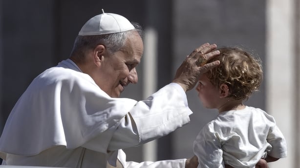 VATICAN CITY, VATICAN - 2025/06/01: Pope Leo XIV greets a child upon his arrival in his popemobile before celebrating Mass for the Jubilee of Families, Children, Grandparents, and the Elderly in St. Peter's Square at the Vatican. (Photo by Maria Grazia Picciarella/SOPA Images/LightRocket via Getty I