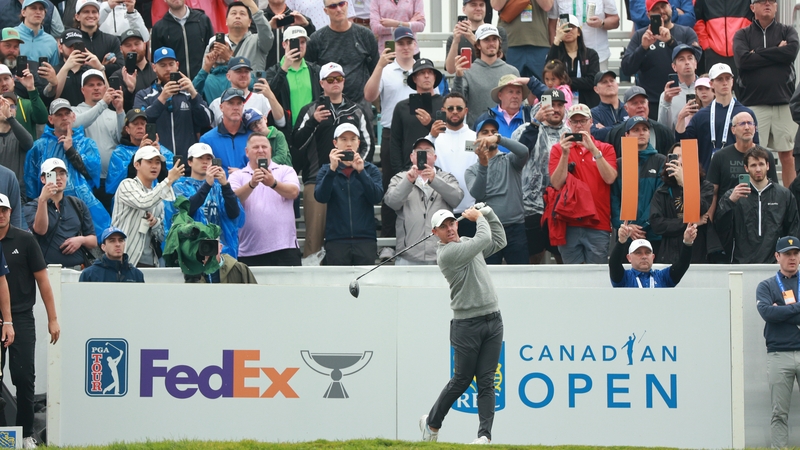 Rory McIlroy playing his tee shot at the first