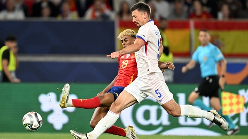 Lamine Yamal scores Spain's fifth goal whilst under pressure from Clement Lenglet