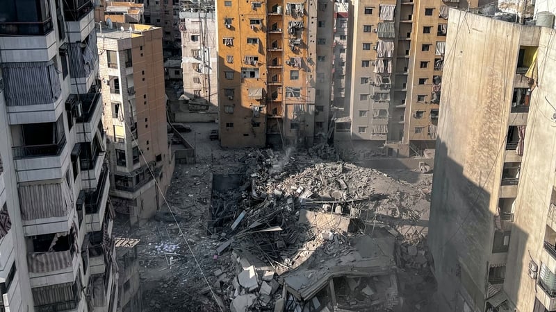 A building is destroyed and damage is caused to surrounding buildings and vehicles after Israeli airstrike in the Dahieh area of Beirut, Lebanon