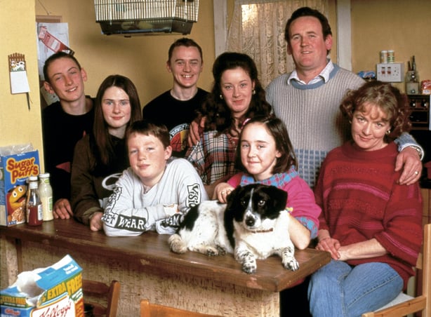 a group of people posing for a photo