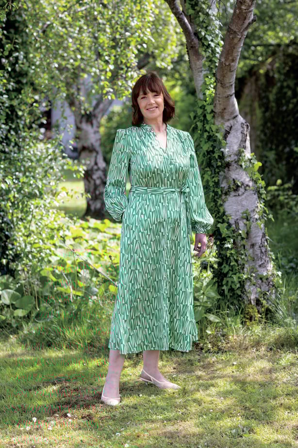 a person in a green dress