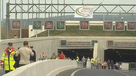 People walk through the new Limerick tunnel (2010)