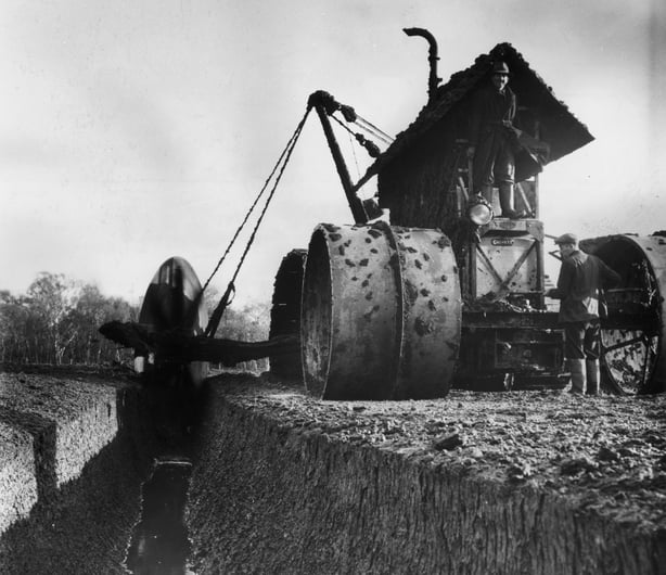 1951: Digging a trench in a peat bog. The peat bogs of western Ireland are being used to help solve the national fuel shortage and replace imported coal from Britain. Original Publication: Picture Post - 7382 - Peat - unpub. (Photo by Charles Hewitt/Picture Post/Hulton Archive/Getty Images)