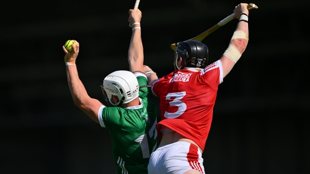 28 May 2023; Aaron Gillane of Limerick wins possession ahead of Damien Cahalane of Cork during the Munster GAA Hurling Senior Championship Round 5 match between Limerick and Cork at TUS Gaelic Grounds in Limerick. Photo by Ray McManus/Sportsfile