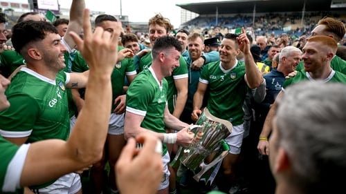 Limerick captain Declan Hannon celebrates with team-mates, including Aaron Gillane, Gearóid Hegarty, Conor Boylan, Dan Morrissey and Cian Lynch after retaining the Mick Mackey cup in 2024
