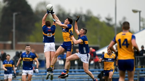 19 April 2025; Jimmy Feehan, left, Mark Russell of Tipperary and Brian McNamara of Clare contest a kickout during the Munster GAA Football Senior Championship semi-final match between Clare and Tipperary at Zimmer Biomet Cusack Park in Ennis, Clare. Photo by Tom Beary/Sportsfile