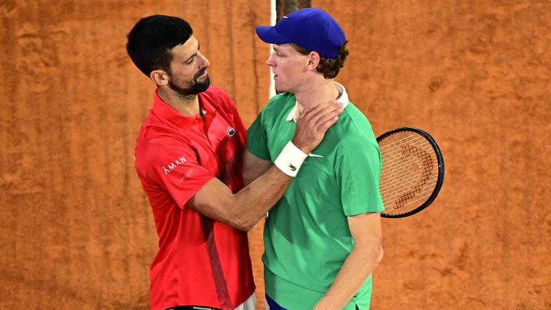 Novak Djokovic congratulates Jannik Sinner after the Italian decisively won their semi-final