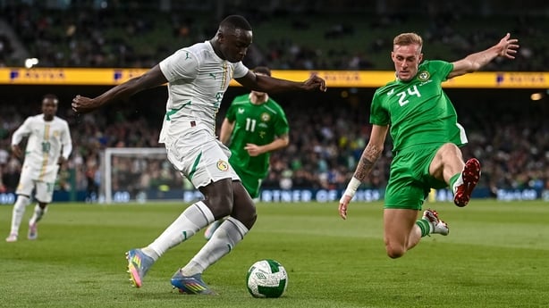 6 June 2025; Antoine Mendy of Senegal is tackled by Killian Phillips of Republic of Ireland during the international friendly match between Republic of Ireland and Senegal at the Aviva Stadium in Dublin. Photo by Ben McShane/Sportsfile