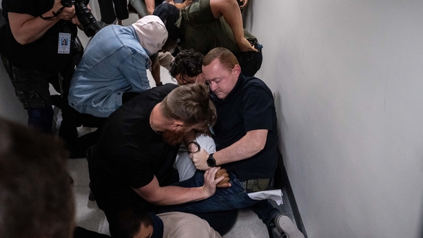 NEW YORK, NEW YORK - JUNE 6: A Dominican man is detained by plainclothes officers with Immigration and Customs Enforcement (ICE) after his immigration court hearing at the Jacob K. Javitz Federal Building on June 6, 2025 in New York City. Federal agents are arresting immigrants outside of immigratio