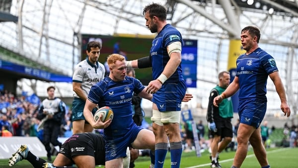 7 June 2025; Ciarán Frawley of Leinster with teammates Jack Conan and Scott Penny after scoring their side's sixth try during the United Rugby Championship semi-final match between Leinster and Glasgow Warriors at the Aviva Stadium in Dublin. Photo by Bre