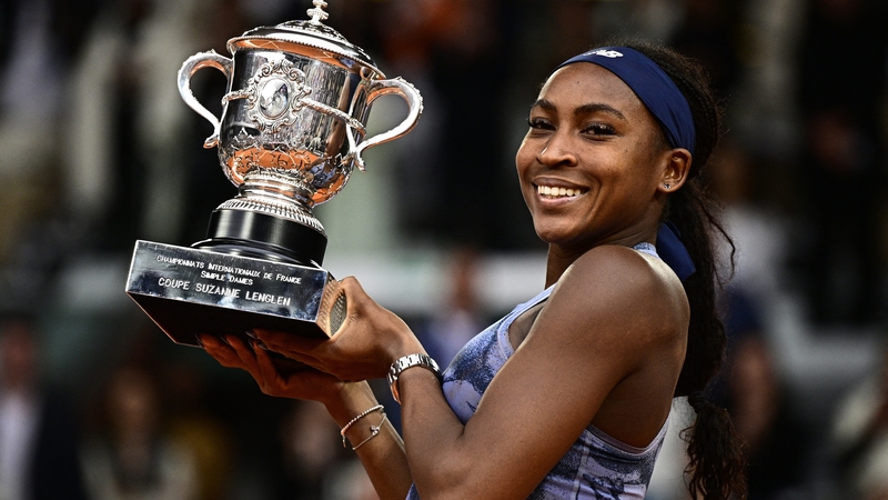 Coco Gauff holds the trophy after winning the French Open final