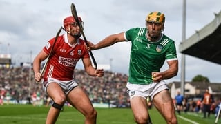 7 June 2025; Dan Morrissey of Limerick in action against Brian Hayes of Cork during the Munster GAA Hurling Senior Championship final match between Limerick and Cork at LIT Gaelic Grounds in Limerick. Photo by John Sheridan/Sportsfile