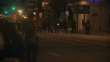 Protesters and law enforcement officials clash in LA