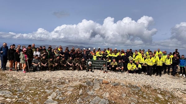 The climb culminated with a group photograph at the summit of the Reek