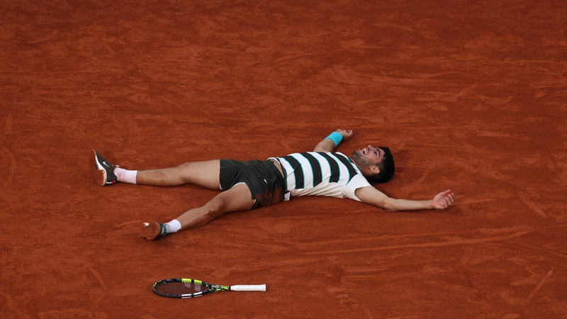 Carlos Alcaraz reacts to the winning point