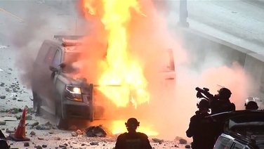 Confrontations between police and protesters continue in LA
