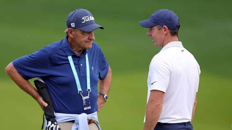 Dr Bob Rotella (L) chats to Rory McIlroy at Quail Hollow in May