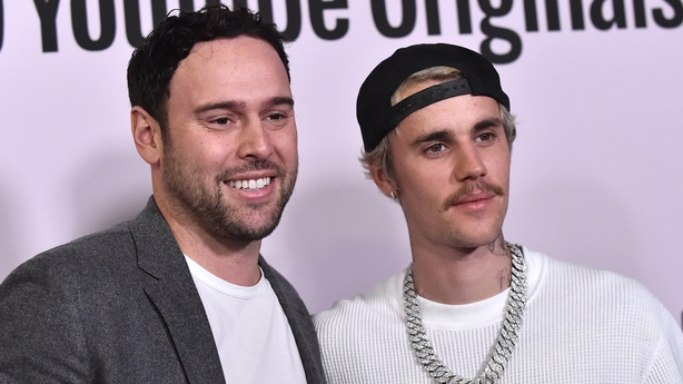 US businessman Scooter Braun (L) and Canadian singer Justin Bieber arrive for YouTube Originals' "Justin Bieber: Seasons" premiere at the Regency Bruin Theatre in Los Angeles on January 27, 2020. (Photo by LISA O'CONNOR / AFP) (Photo by LISA O'CONNOR/AFP via Getty Images)