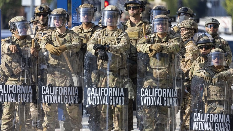 California National Guard members look on during a demonstration in Los Angeles last month