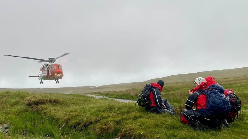 Rescuers await the departure of the Coast Guard helicopter following the handover of the casualties at Benbulbin (Pic: SLMRT responder D Barnes)