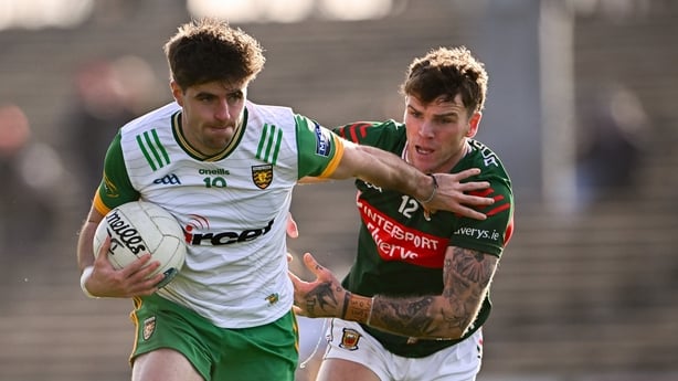 23 March 2025; Dáire Ó Baoill of Donegal in action against Jordan Flynn during the Allianz Football League Division 1 match between Mayo and Donegal at Hastings Insurance MacHale Park in Castlebar, Mayo. Photo by Piaras Ó Mídheach/Sportsfile