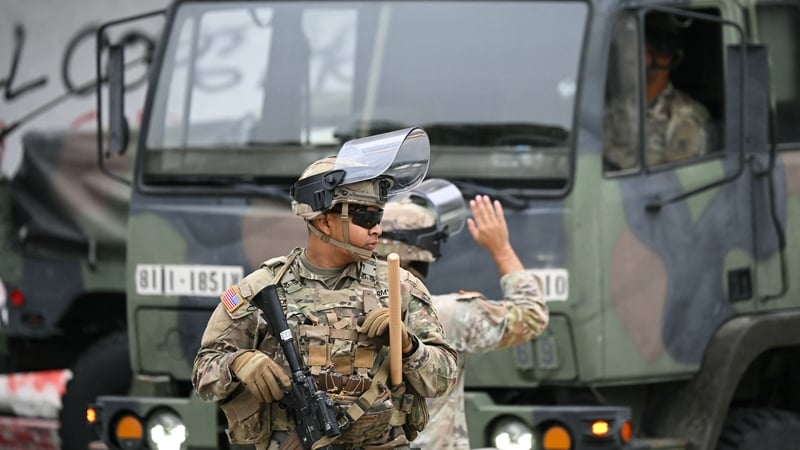 The president said the National Guard deployment was preventing the city from 'burning to the ground'