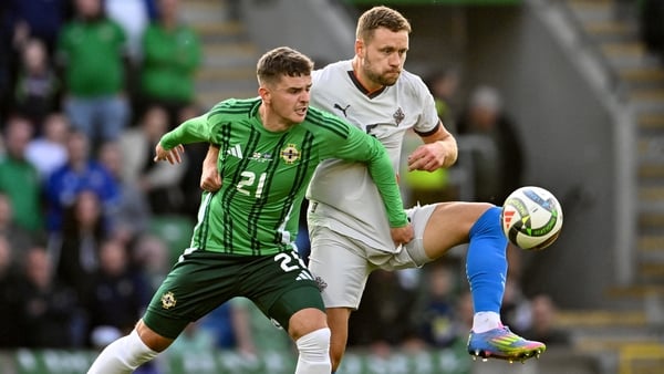 Northern Ireland , United Kingdom - 10 June 2025; Ronan Hale of Northern Ireland in action against Sverrir Ingason of Iceland during the International Friendly match between Northern Ireland and Iceland at Clearer Twist National Football Stadium at Windso