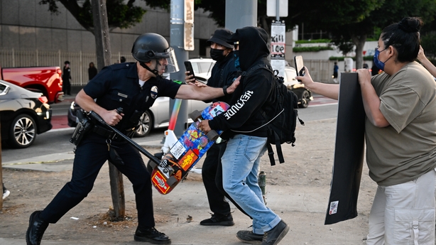LOS ANGELES, CALIFORNIA - JUNE 10: Police confront with anti-ICE protesters near Federal Building and Metropolitan Detention Center in Los Angeles, California on June 10, 2025 amid protests over immigration raids. (Photo by Tayfun Coskun/Anadolu via Getty Images)