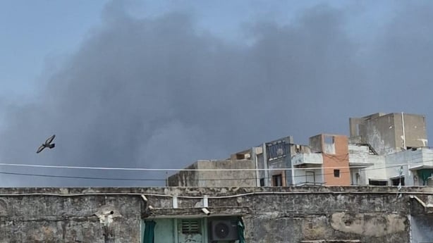 GUJARAT, INDIA - JUNE 12: Smoke rises after a plane crash shortly after takeoff from Sardar Vallabhbhai Patel International Airport in India's western state of Gujarat on June 12, 2025. The crash occurred in the Meghaninagar area, according to a report by the Press Trust of India, citing local autho