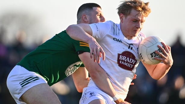 23 April 2024; Niall Dolan of Kildare in action against Liam Kelly of Meath during the EirGrid Leinster GAA Football U20 Championship semi-final match between Kildare and Meath at Manguard Park at the Kildare GAA Centre of Excellence in Hawkfield, Kildare. Photo by Tyler Miller/Sportsfile