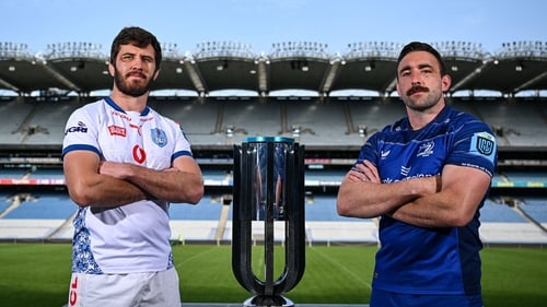 Bulls captain Ruan Nortje (l) and Leinster's Jack Conan pictured with the URC trophy