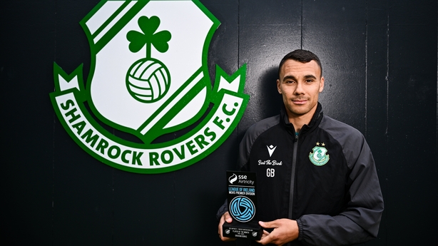 12 June 2025; Graham Burke of Shamrock Rovers poses for a portrait with his SSE Airtricity / SWI Player of the Month Award for May 2025 at Shamrock Rovers Football Club Academy in Kingswood Cross, Dublin. Photo by Ben McShane/Sportsfile *** NO REPRODUCTION FEE ***