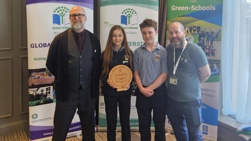 Students Kate Sinnamon and Eanna Cullen and teacher Shaun Horan accepted the award on behalf Mercy Secondary School